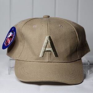 A Initial Tan Cap
